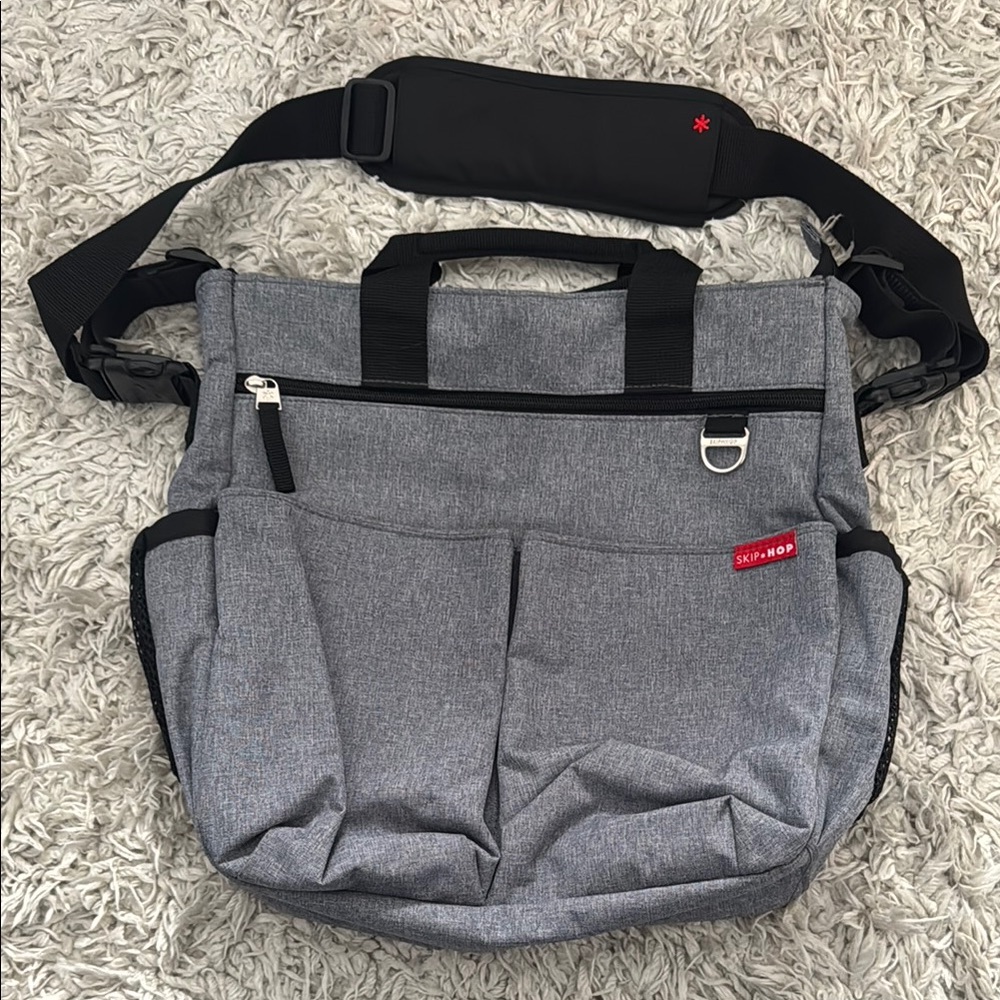 Skip Hop Gray Diaper Bag with Adjustable Strap and Durable Fabric